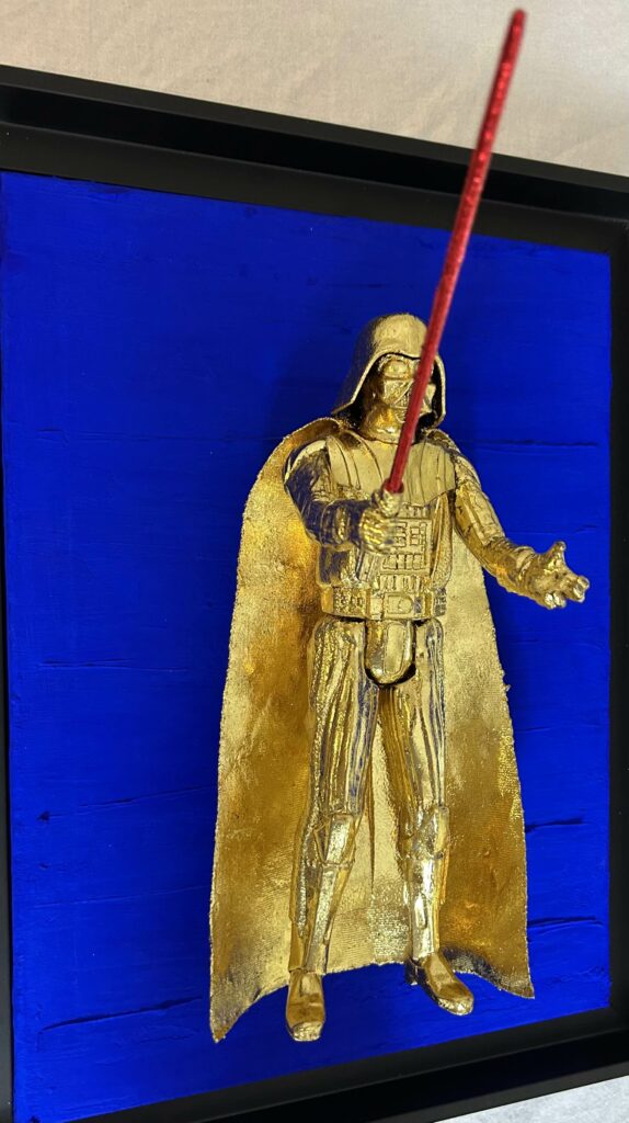 Seb Machten Contemporary pop art sculpture of a gold armored dark figure with red light sword on deep blue background, inspired by iconic sci-fi villain archetypes