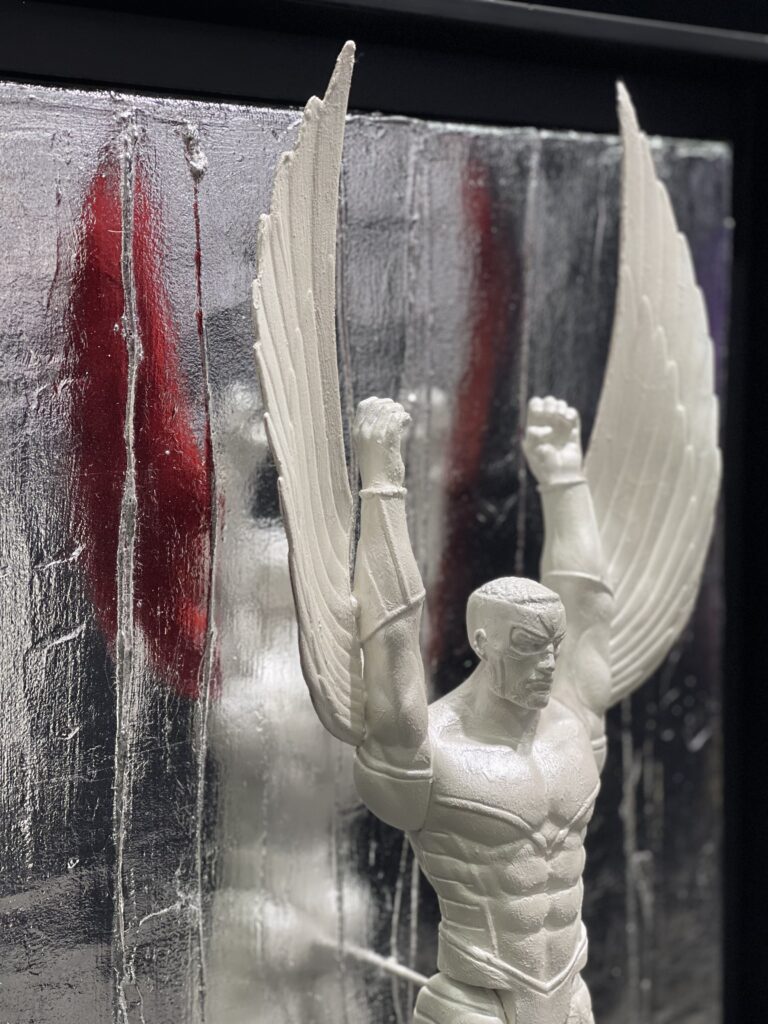 winged superhero sculpture inspired by Falcon from Avengers