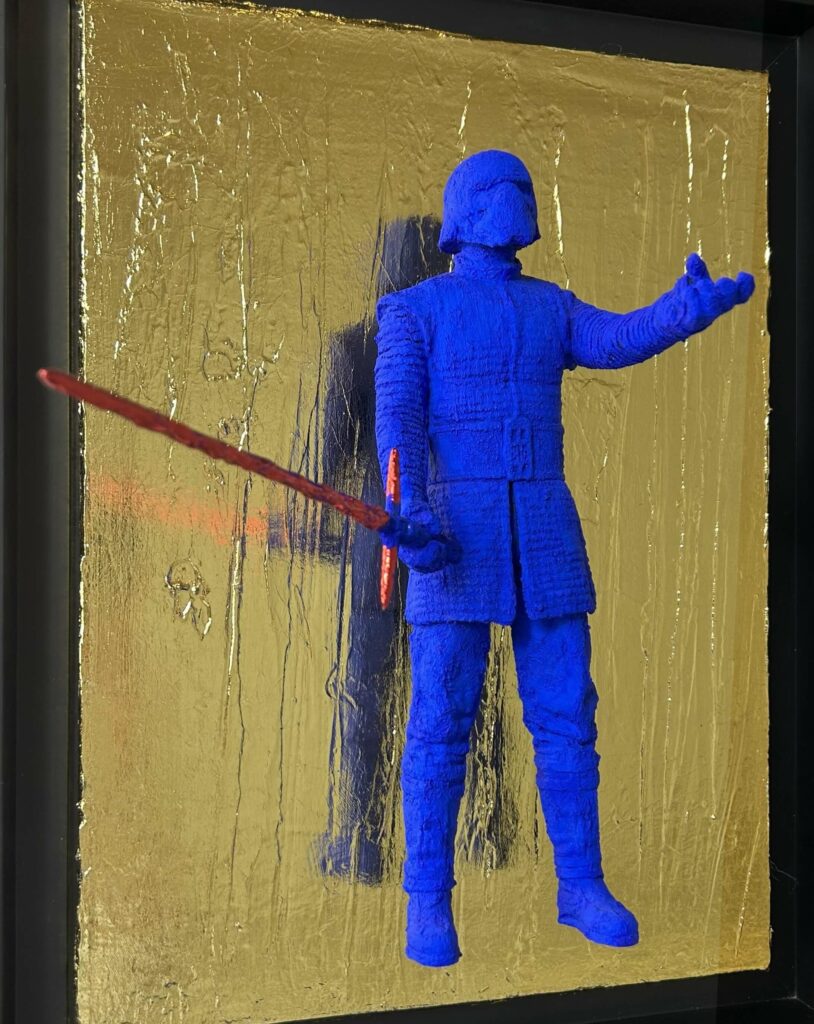 Seb Machten contemporary artwork with ultramarine Kylo Ren inspired figure and red lightsaber on gold leaf surface