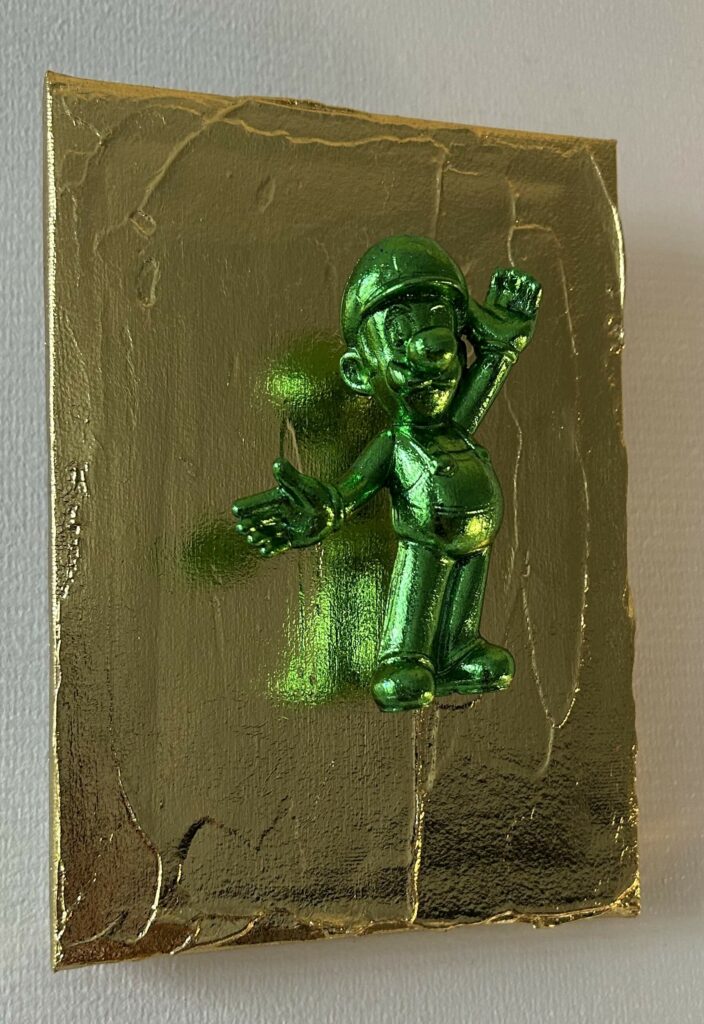 Seb Machten contemporary pop art sculpture with metallic green Luigi-inspired figure on gold textured surface