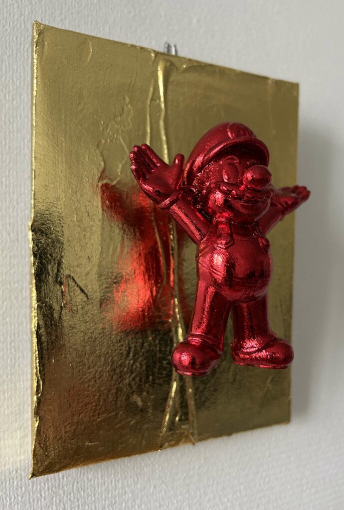 Seb Machten contemporary pop art sculpture with metallic red Mario-inspired figure on gold textured surface