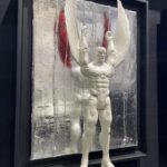 winged superhero sculpture inspired by Falcon from Avengers