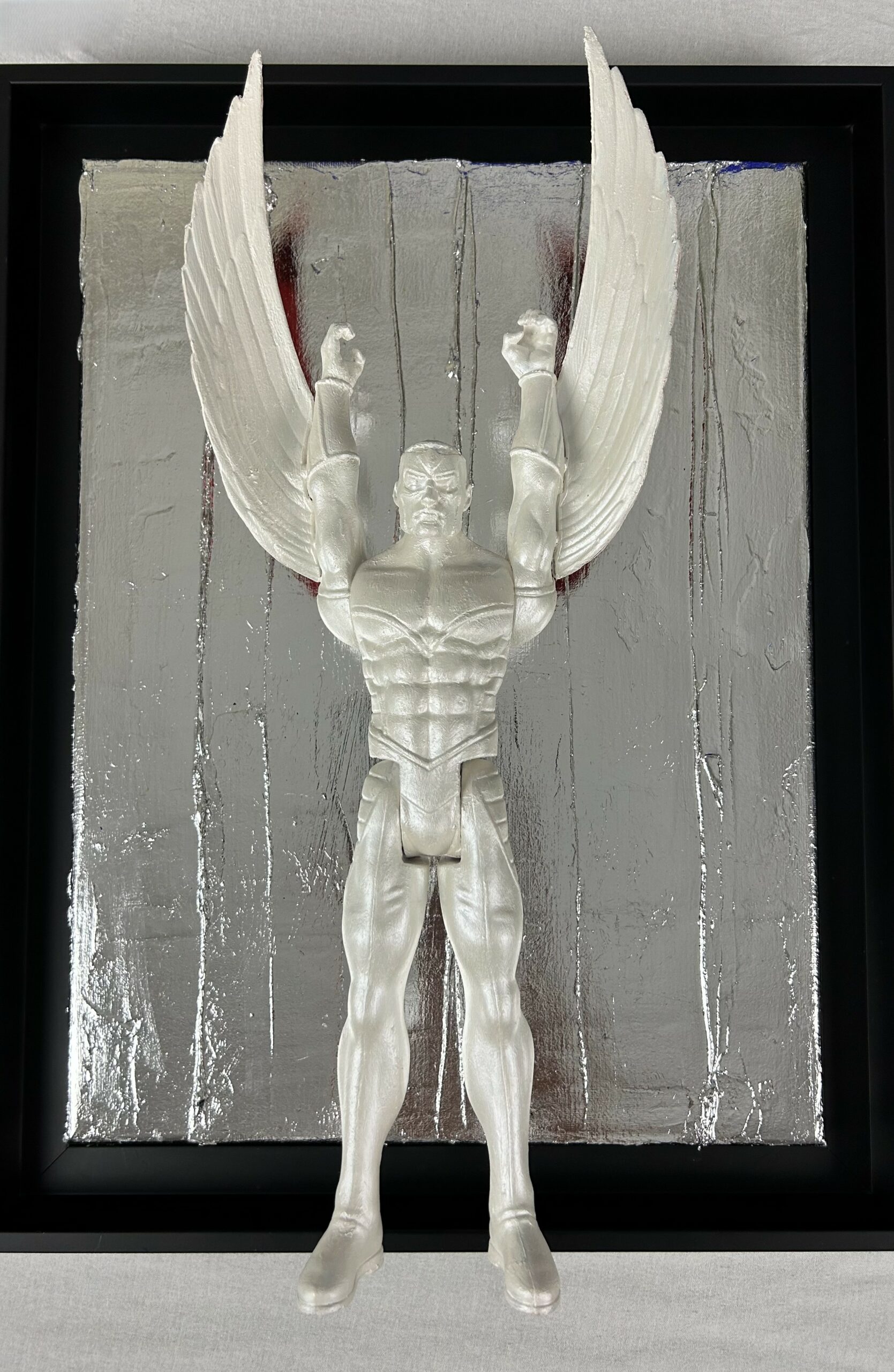 winged superhero sculpture inspired by Falcon from Avengers