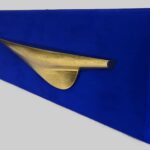 Contemporary minimalist pop art sculpture with a gold fluid line on deep blue background, inspired by sea horizon and light reflection